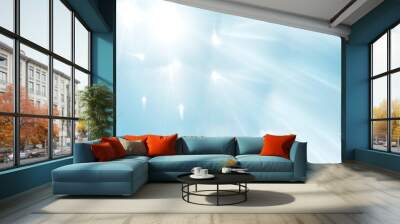 Blue blurred background with sun rays. Wall mural