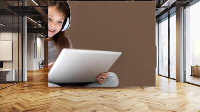 Kids distance learning. Cute clever little girl using laptop at home. Education, online study, home studying, schoolgirl children lifestyle concept. Horisontal banner. Copy space for text. Wall mural