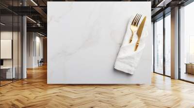 Tableware at white napkin on white marble background Wall mural