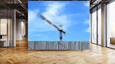 construction crane on blue sky background Wall mural