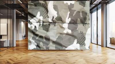 Camouflage fabric texture background. Factory material Wall mural