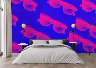 Sunglasses against blue background neon seamless pattern Wall mural