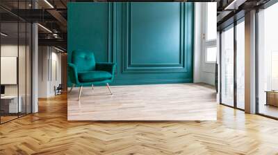 Beautiful luxury classic blue green clean interior room in classic style with green soft armchair. Vintage antique blue-green chair standing beside emerald wall. Minimalist home design Wall mural