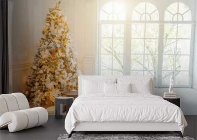 Classic christmas New Year decorated interior room New year tree. Christmas tree with gold decorations. Modern white classical style interior design apartment, large window. Christmas eve at home Wall mural