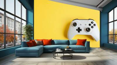 white joystick gamepad, game console on yellow colourful trendy modern fashion pin-up background. co Wall mural