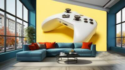 White joystick gamepad, game console on yellow colourful trendy modern fashion pin-up background. Computer gaming competition videogame control confrontation concept. Cyberspace symbol Wall mural