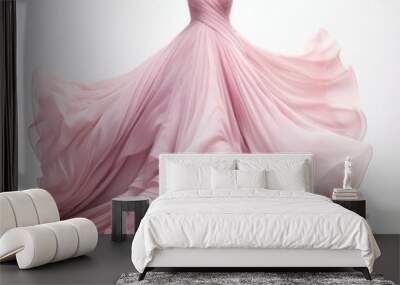 a beautiful pink-powder dress lies on dummy a white background  Wall mural