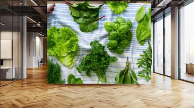 Different types of fresh herbs on a towel Wall mural