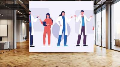 Male and feamle doctor talking. Healthcare services, Ask a doctor. Therapist in uniform with stethoscope. Gynecologist and urologist, medical full length team concept. Medical clinic staff. Wall mural