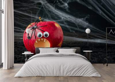 Halloween background. Scary apple with spiders on a dark background. Halloween food. Banner. Copy space. Wall mural