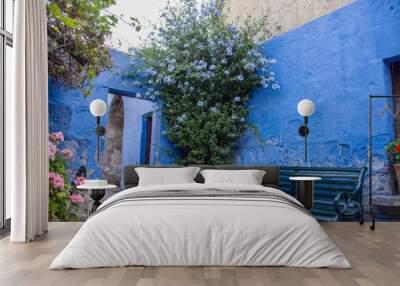 Blue internal courtyard with bench in the Monastery of Santa Catalina de Siena is a monastery of nuns of the Dominican Second Order, located in Arequipa (Peru) Wall mural