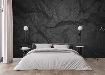 Black crumpled sheet of paper with vignetting Wall mural