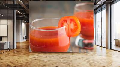 two glasses of freshly squeezed tomato juice Wall mural