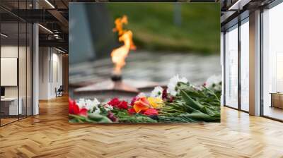 eternal flame and flowers in memory of the fallen soldiers Wall mural