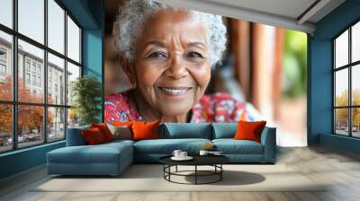 Portrait of a happy senior black woman smiling at home Wall mural