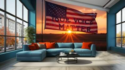 Sunset view of an American flag displaying a message of empowerment in an open field setting Wall mural