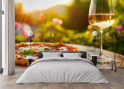 pizza and wine in the garden. selective focus. Wall mural