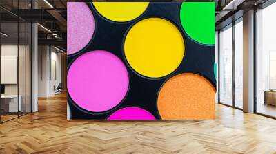 Multicolored neon eyeshadow palette. Make-up. Beauty products. Bright colorful beautiful background. Tool for makeup artist. Cosmetic. Visagiste. Beauty shop. Summer eye shadow. Yellow, pink, green. Wall mural