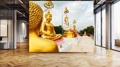 Golden buddha in thailand temple Wall mural