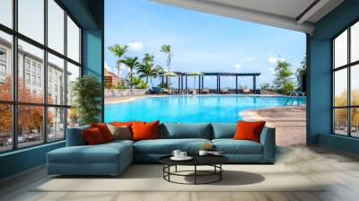 landscape swimming pool blue sky with clouds. Tropical beautiful hotel in thailand. Wall mural