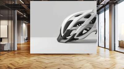 Minimalist side view of a floating bicycle helmet on a white background. AI generative. Wall mural