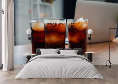 Double cool ice soft drink cola carbonated liquid fresh food with soda water, Cola drinking with ice in glass ready to refresh you, A cola soft drink is placed on the desk. Wall mural