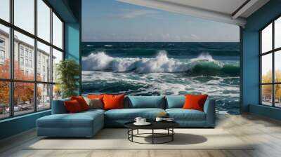 A large wave is crashing into the ocean Wall mural