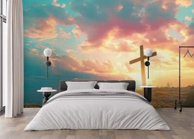 Jesus Christ cross. The Crucifixion, Resurrection and Easter concept. The Christian cross with a sunset scene in warm tone background with copy space Wall mural