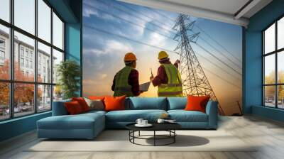 electrical engineer working at the power station See the planning of electricity production at high voltage poles. Wall mural