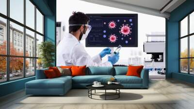 A professional scientist working in a modern lab, surrounded by equipment and analyzing samples while observing a virus illustration on their computer screen, showcasing the vital role of research  Wall mural