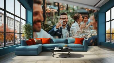 Business professionals celebrate during an elegant dinner, raising glasses and sharing smiles, capturing the spirit of networking and collaboration. Wall mural