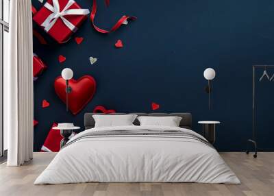 Elegant Valentine's Day background with red gift boxes and white ribbons arranged on a dark blue table, showcasing a romantic and festive flat lay design perfect for holiday advertising greeting cards Wall mural