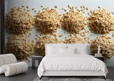 Airborne oat flakes creating a whimsical display against a crisp white backdrop Wall mural