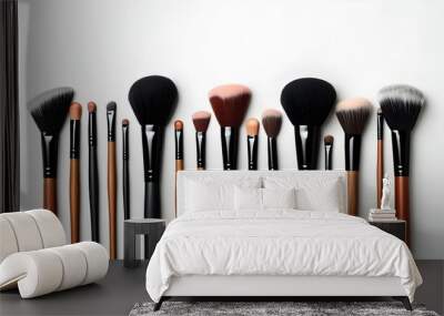 Array of makeup brushes on white background showcasing beauty tools and professional cosmetic applicators Wall mural