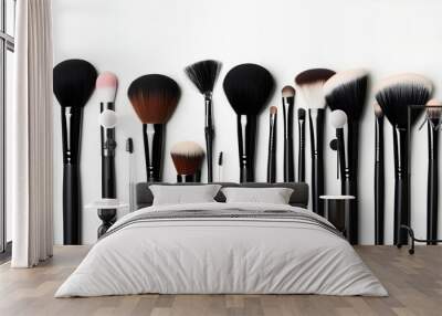 Array of makeup brushes on white background showcasing beauty tools and professional cosmetic applicators Wall mural