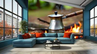 Campsite coffee maker: close-up of outdoor cooking equipment for nature enthusiasts Wall mural