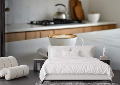 Cappuccino with intricate latte art beside a cookie on a pristine white table in a stylish minimalist kitchen Wall mural