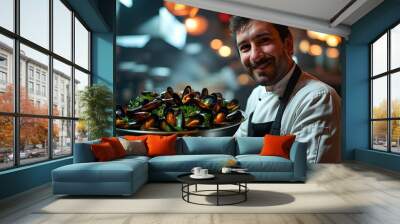 Cheerful male chef presenting a substantial bowl of fresh mussels in an inviting, softly lit restaurant ambiance Wall mural