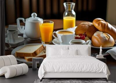 Cozy breakfast tray featuring fresh bread, coffee, and juice for a nourishing hotel room dining experience Wall mural