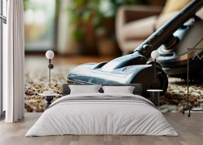 Detailed view of a vacuum cleaner attachment on a carpet emphasizing the significance of maintaining a clean living space. Wall mural