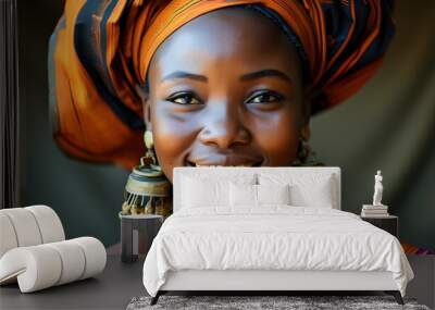 Elegant African woman in vibrant traditional attire and stunning earrings radiating joy and beauty Wall mural