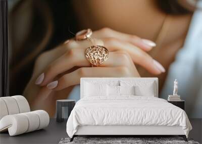 Elegant jewelry ring displayed on a womans hand, showcasing modern fashion and beauty in a close-up perspective Wall mural