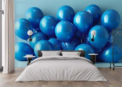 Festive vibrant blue balloons floating against a serene soft blue backdrop for joyous celebrations and party moments Wall mural