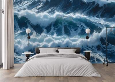 Majestic ocean wave crashing with white foam against vibrant deep blue waters Wall mural