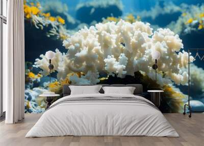 Radiant white coral flourishing in a vibrant blue ocean under bright sunlight Wall mural