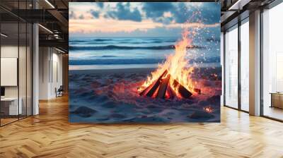 Serene beach bonfire casting warm glow as sunset paints the sky, with gentle ocean waves lapping the shore in tranquil backdrop Wall mural