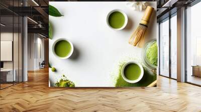 Serene composition of matcha powder and tea tools on a clean white background, perfect for showcasing creativity and tranquility in tea preparation Wall mural