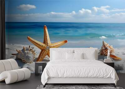 Serene white sand beach adorned with starfish and conch shells against a vibrant blue sea backdrop Wall mural