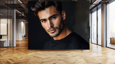 Stylish male model showcasing black t-shirt fashion

 Wall mural