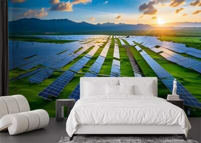 Sustainable solar panels capturing sunlight on a green landscape beneath a bright blue sky Wall mural